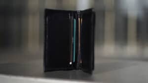 Close-up of the Viper Wallet used in magic tricks, showcasing its sleek design and secret compartmen.