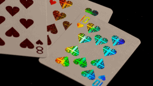 Close-up of holographic double metal playing cards from London Diffractor set.