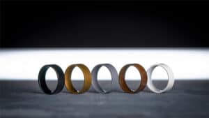 Elegant rings with a metallic finish showcasing a liquify effect.