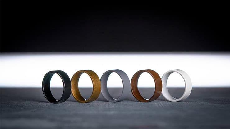 Elegant rings with a metallic finish showcasing a liquify effect.