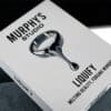 Close-up of the "Liquify" magic trick box by Tobias Dostal for illusions and mentalism.