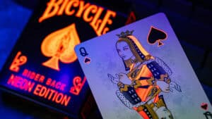 Vibrant Bicycle neon orange rider back playing card with solar-orange accents, perfect for magic tri.