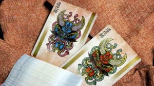 Ronin Spade Clan Blue playing card from Kings Wild Project, featuring intricate dragon design.