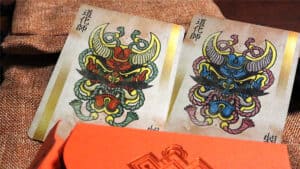 Ronin Diamond Clan playing cards featuring intricate dragon designs for magic tricks and cardistry.
