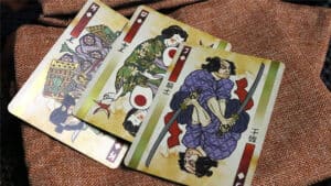 Ronin themed green playing cards from Kings Wild Project, perfect for magic tricks and card enthusia.