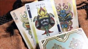 Ronin Heart Clan Edition Red playing card with intricate samurai design.