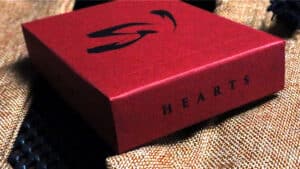 Red Ronin Heart Clan playing cards with bold black design, perfect for magic tricks and card enthusi.