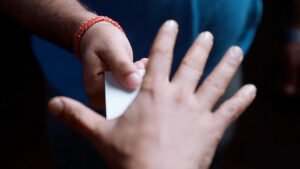 Close-up of a magic card trick performed by Manoj Kaushal.