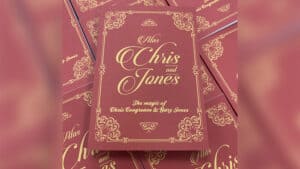 Softcover book titled "Alas Chris & Jones" with ornate gold design.