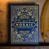 Blue Mosaic Playing Cards box with intricate gold design, themed around magic and illusions.