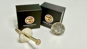 Close-up of a screw coin and packaging from Tango Magic for magic tricks.