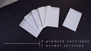 Set of five gimmick envelopes and one normal envelope for magic tricks and illusions.