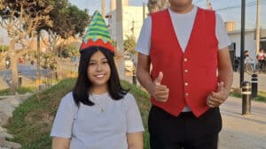 Performers showcasing magical tricks outdoors for an audience.