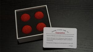 Bright red crochet balls for magic tricks and illusions. Perfect for magicians seeking high-quality,.