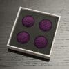 Bright purple crochet balls for magic tricks and illusions. Perfect for magicians and performers see.