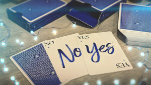 Close-up of No Yes cards used in a magical card trick performance.