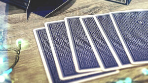 Close-up of fanned playing cards for magic tricks and illusions.