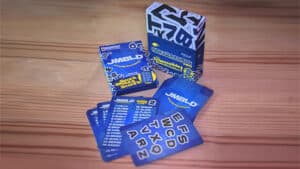 Stegosaurus puzzle game with blue cards and box, perfect for magic trick enthusiasts.