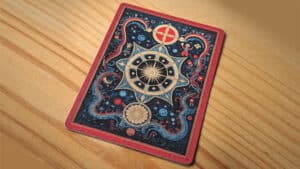 Close-up of a mystical tarot card with celestial and zodiac symbols.