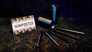 Magical trick with black sticks and props for illusion performances.