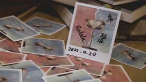 Artistic Polaroid of a heart-shaped lock with Chinese calligraphy, part of the "Memory" magic trick.