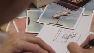 Magical memory trick with sketches and photos for mentalism performance.