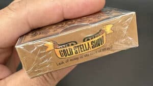 Grand Tesoro playing cards with gold design and "Gold Stella Show" branding.