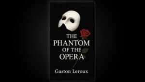 Mask and book cover for The Phantom of the Opera magic trick.