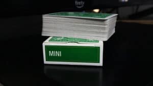 Green mini bicycle playing cards for magic tricks and card illusions.