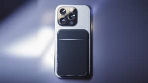 Smartphone with magnetic trick accessory for magic illusions.