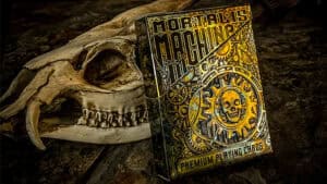 Mortalis Machina Cobalt Edition playing cards with intricate skull and gear design.