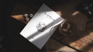 French gambling game with dice and a booklet for magic tricks.