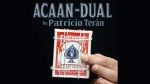 Close-up of ACAAN dual card trick by Patricio Terán with playing cards and rubber bands.