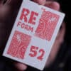 Close-up of Reform 52 card from Matthew Wright's magic trick set.