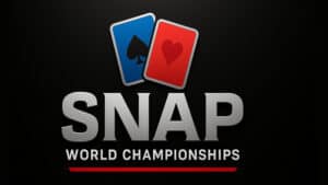 Two playing cards, a spade and a heart, with the word 