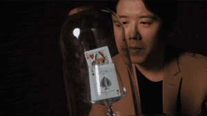 WAKEN PRO magic trick with playing cards inside a glass jar, performed by Bond Lee.