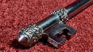 Style metal key with intricate designs, used in magic performances and illusions.