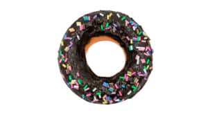 Chocolate donut with colorful sprinkles for magic tricks and illusions.