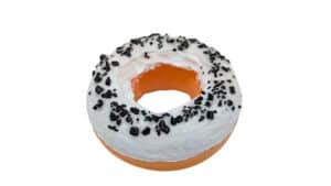 Delicious Cookie & Cream Ultra Donut DX with white icing and black sprinkles, perfect for magic tric.