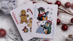 Festive Christmas-themed playing cards featuring snowmen and holiday designs.
