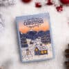 Festive Christmas playing cards featuring snow-covered mountains and holiday scene.