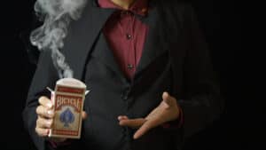 Efficient stage card trick system for magic performances by Menzi Magic & Zhao Xinyi.