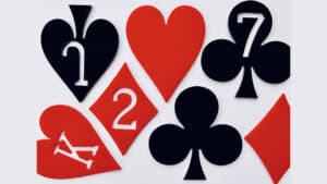 Up of playing cards from the Suits Piece magic trick.