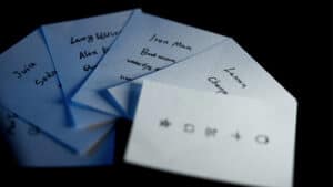 Prophet's Billet magic trick with handwritten notes and symbols for illusion.