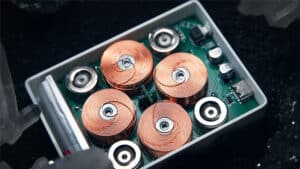 Close-up of Leviti Deck by PITATA with copper coils and electronic components.