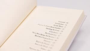 Close-up of a book page with magic tricks and routines by Roberto Mansilla.