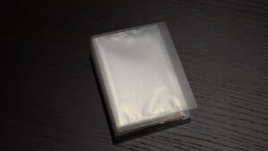 Compact packet trick storage case for magicians and illusionists.