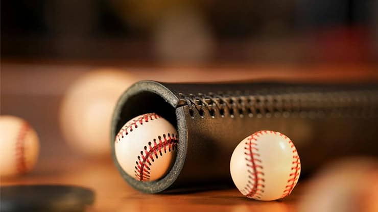 Baseballs and tube prop used in The Chop Tube magic trick by Dave Loosley & TCC Magic.