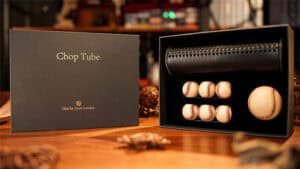 Chop Tube magic prop with baseballs and bat for illusion tricks.