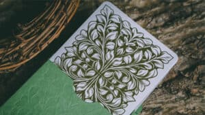 Close-up of intricate Floria MegaJam playing cards designed by Harapan Ong.